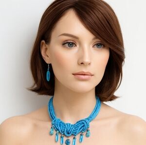 Handmade blue seed bead necklace with knotted center and dangling teardrop Beads